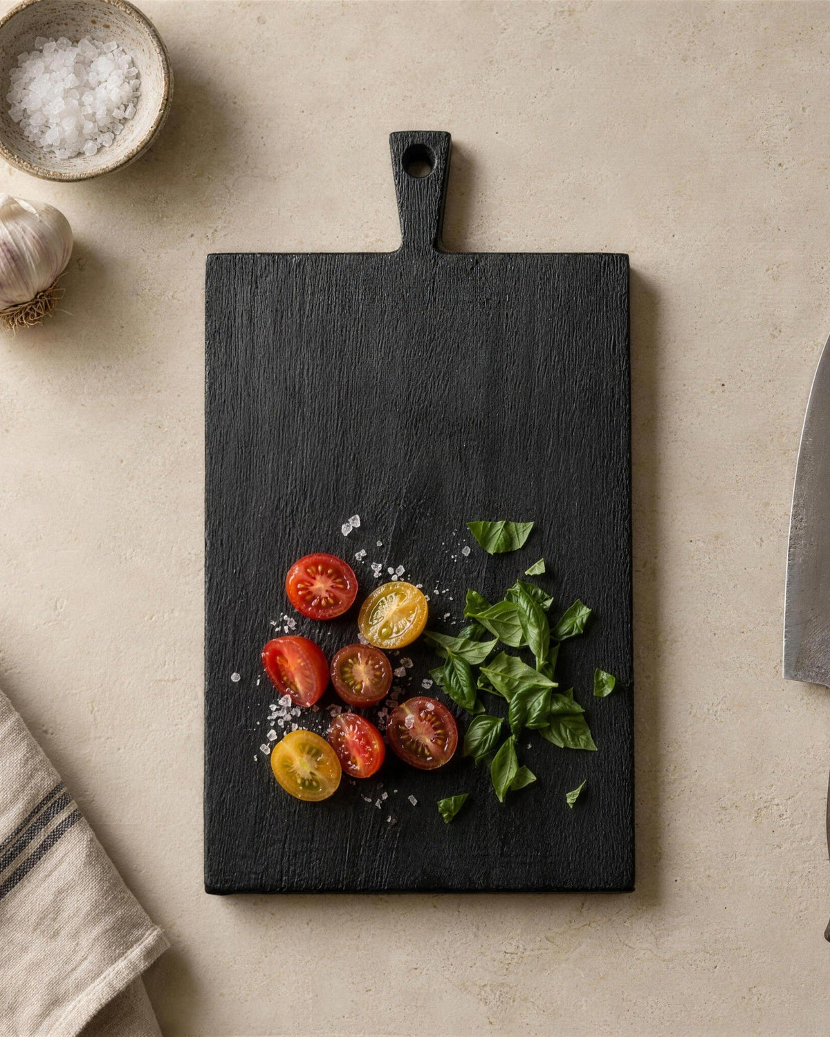 Shoku Prep board with cherry tomatoes and herbs, top view